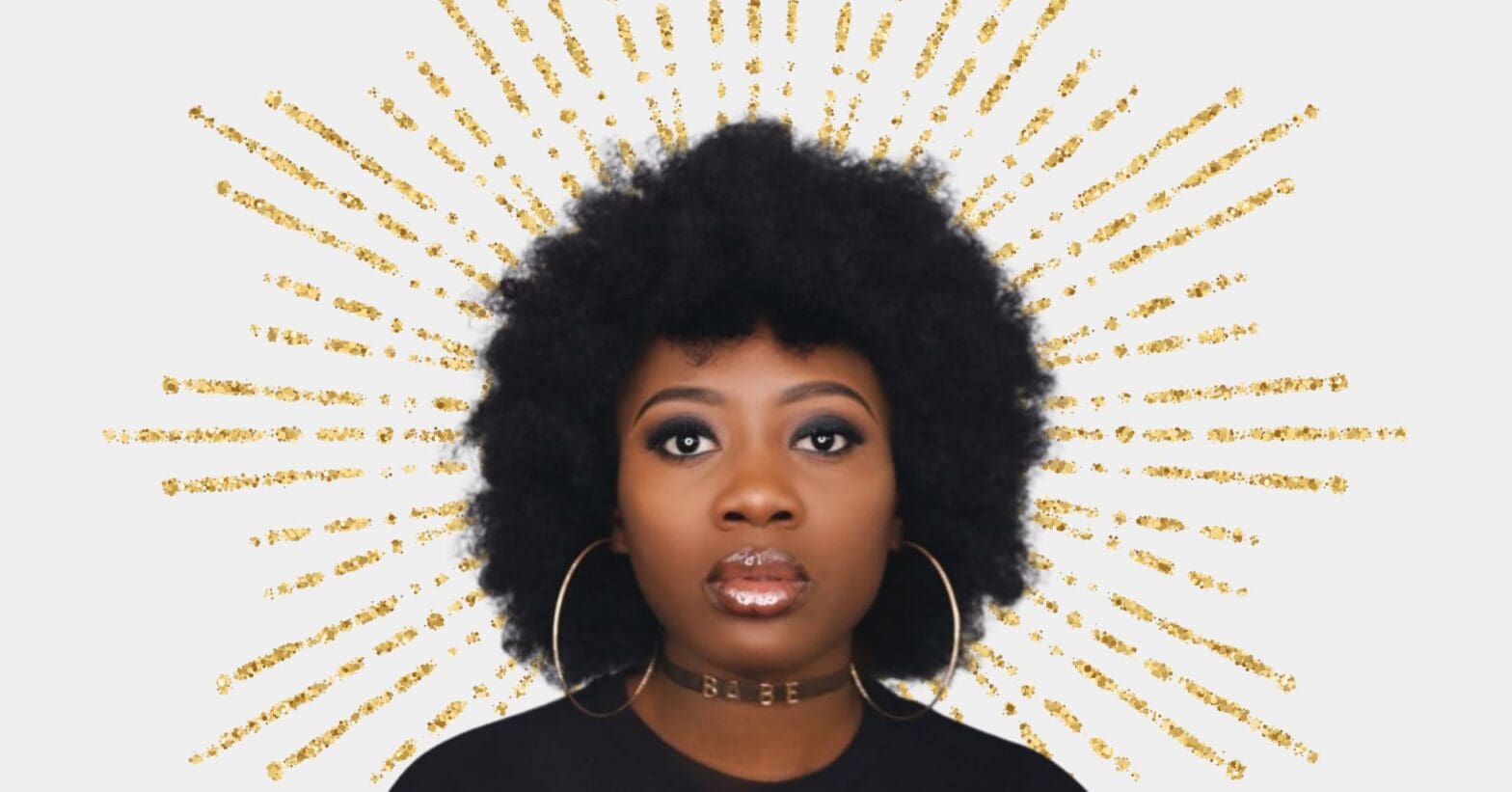 Adanna Madueke with natural hair and gold halo crown background